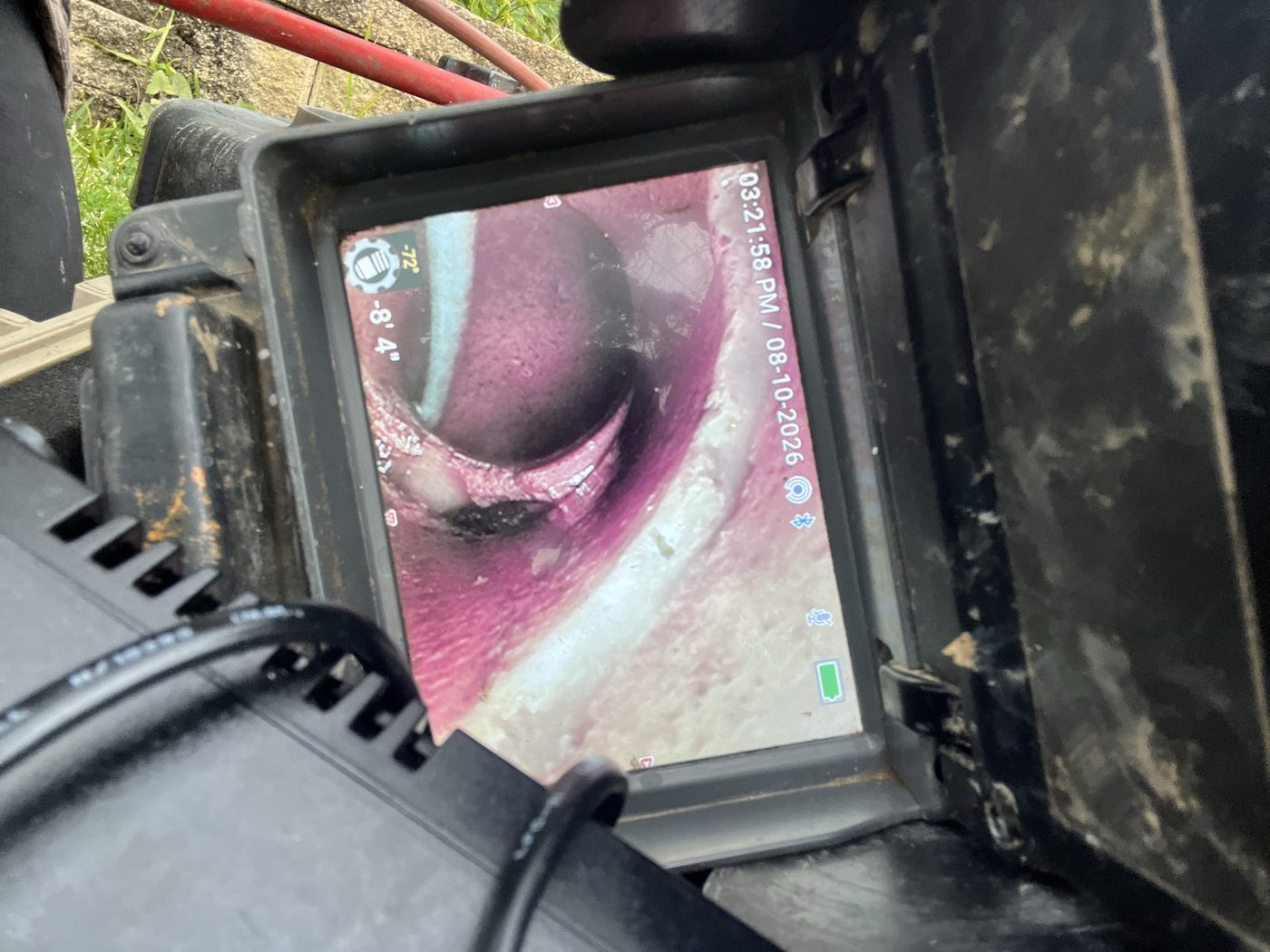 Drain camera monitor showing tree roots in the line on a Mr Splash job in Oatley