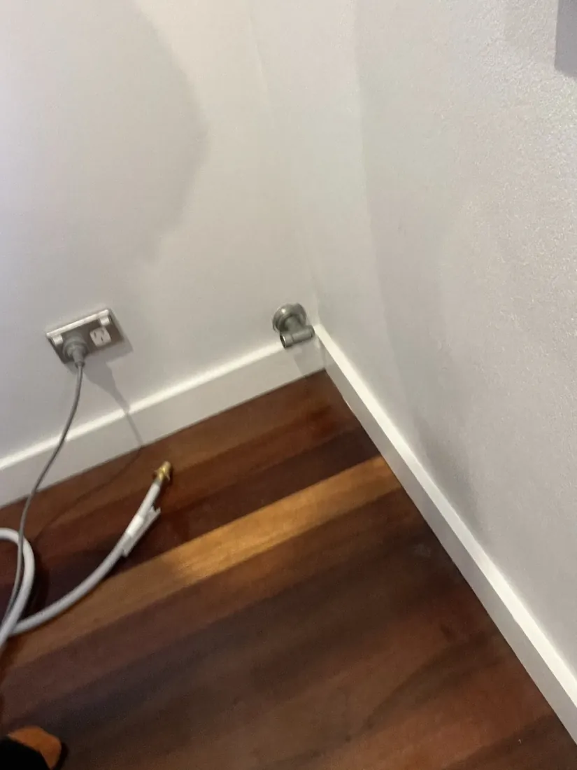 Indoor gas bayonet point and flexible connector checked for a leak on a Mr Splash gas job in Clemton Park