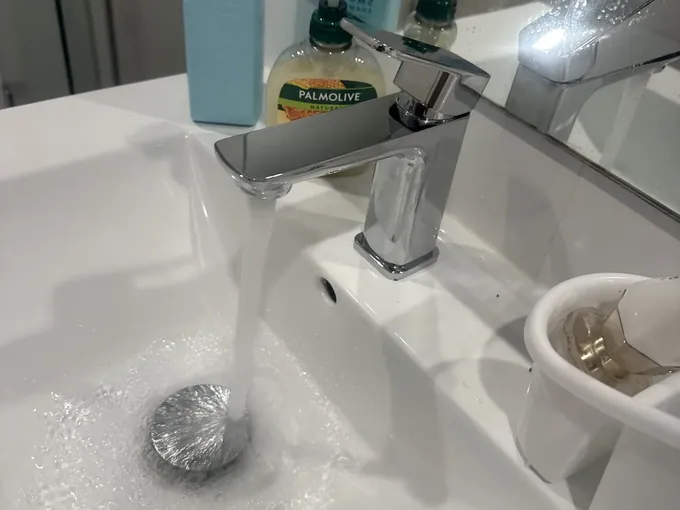 Water running from the basin mixer after the repair in Campsie
