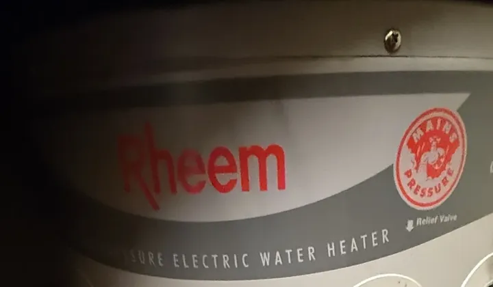 Top of a Rheem mains pressure electric water heater fitted in a cupboard in Rose Bay