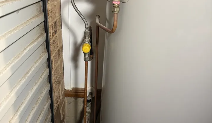 Relief valve, braided hose and isolation valve on a Rheem 315 litre hot water tank