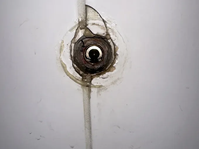 Shower tap body taken out of the tiled wall to get at the fitting in Lane Cove North