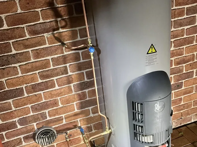 New Rheem gas storage hot water system installed with new copper pipework