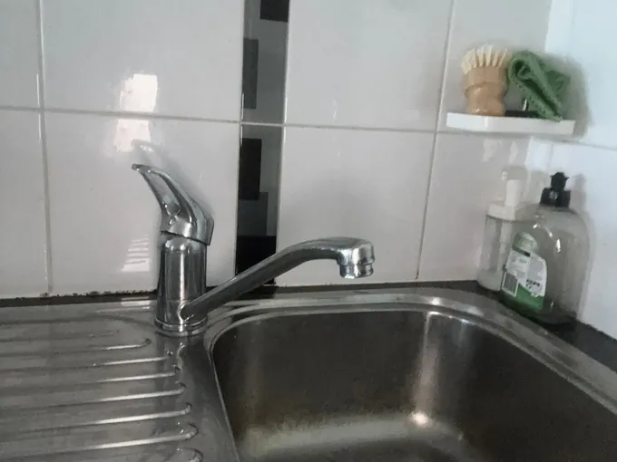 Kitchen sink and mixer tap in a Lakemba kitchen