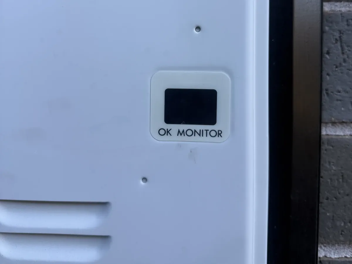 Status monitor on the front panel of a continuous flow gas unit in Denham Court