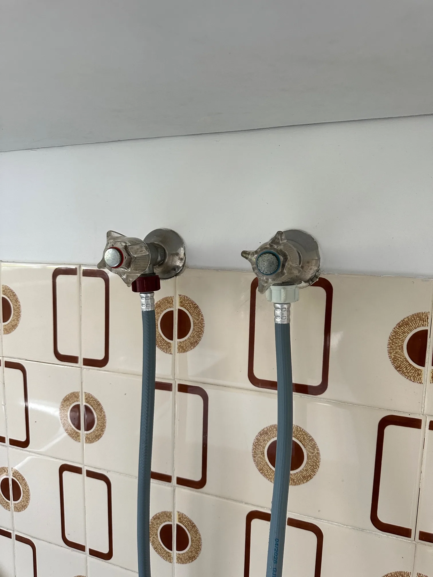 Laundry taps and hoses renewed on a Mr Splash job in Kings Langley