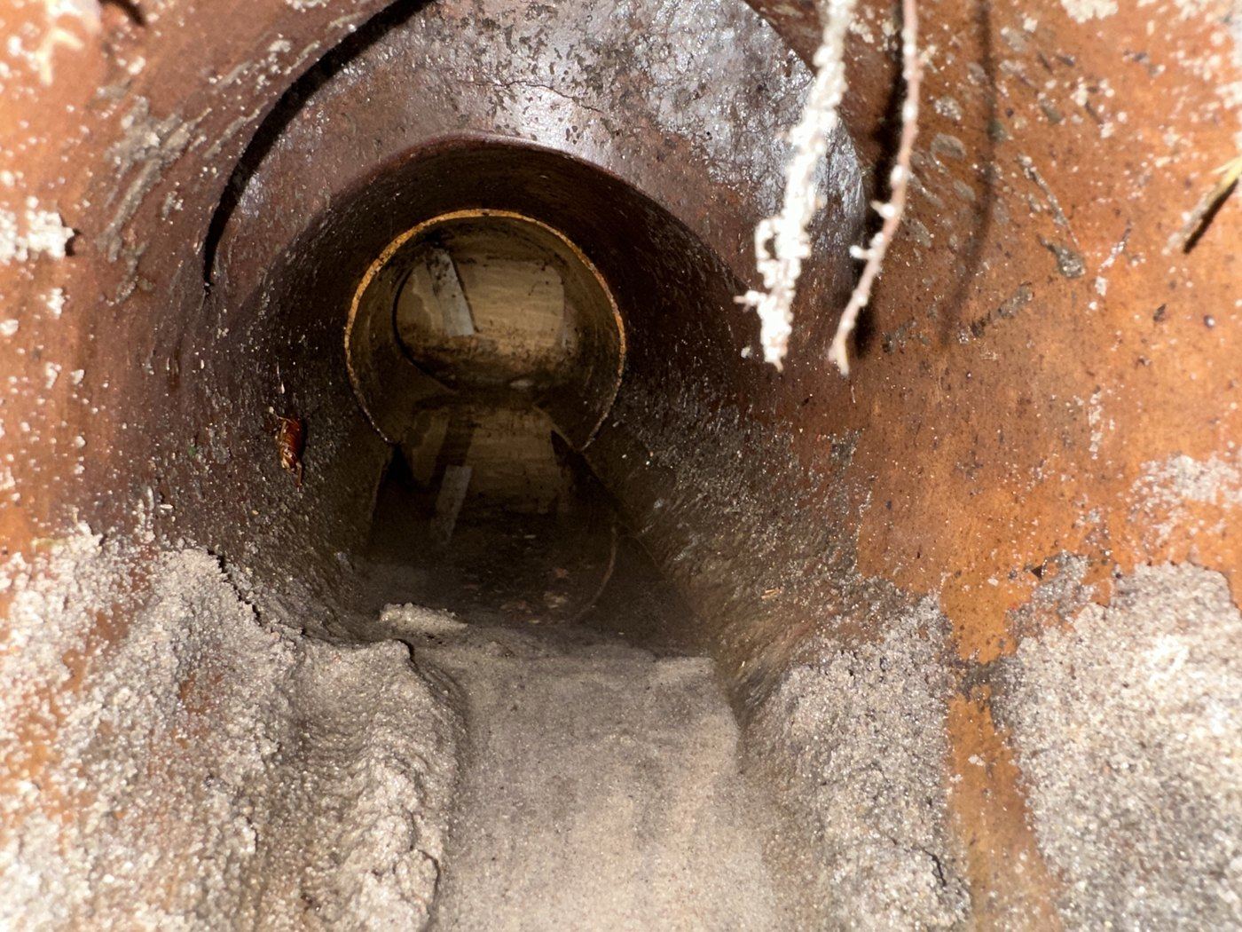 Pipe Relining Macquarie Fields - a liner cured inside a cracked sewer pipe