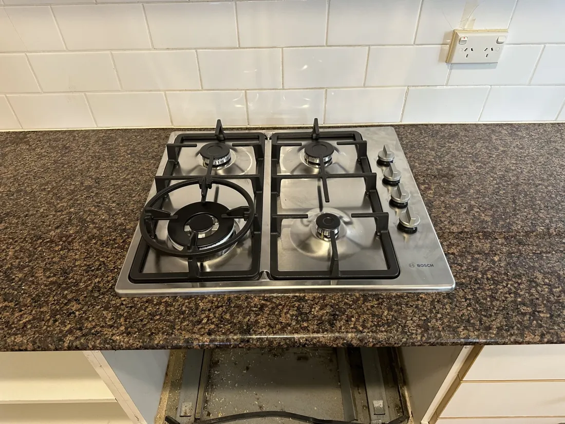 Gas cooktop reconnected and tested after a Mr Splash gas repair in Marrickville