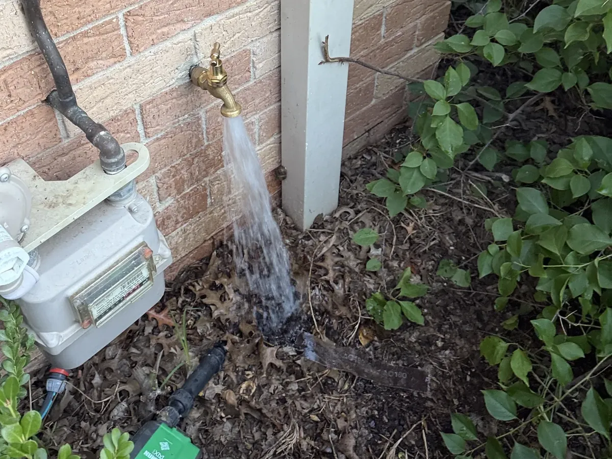 Water spraying from an outdoor tap fitting in Harrington Park