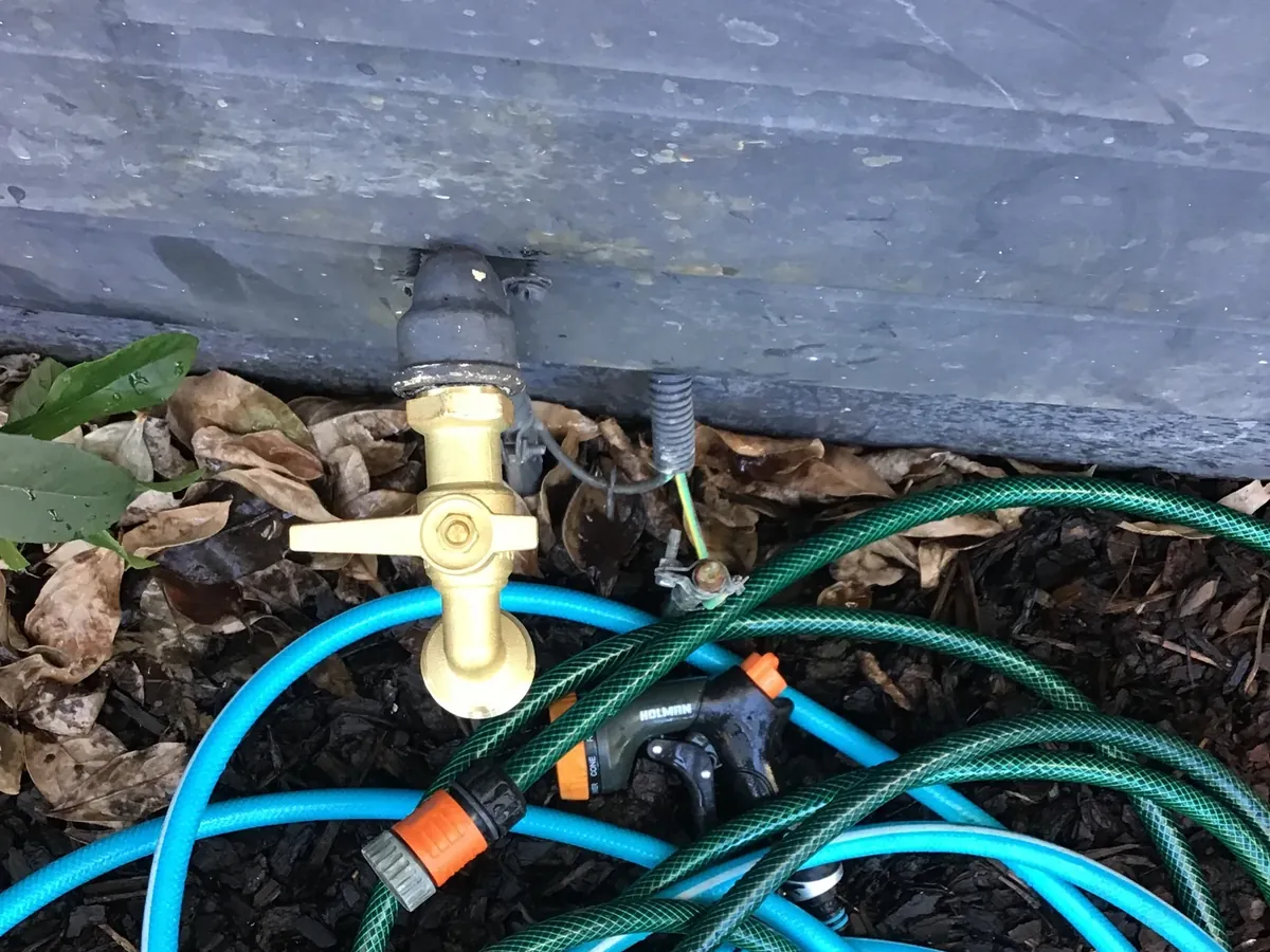 Leaking brass garden tap and hoses in Frenchs Forest