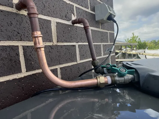 Repaired copper water pipe with new fittings and ball valves