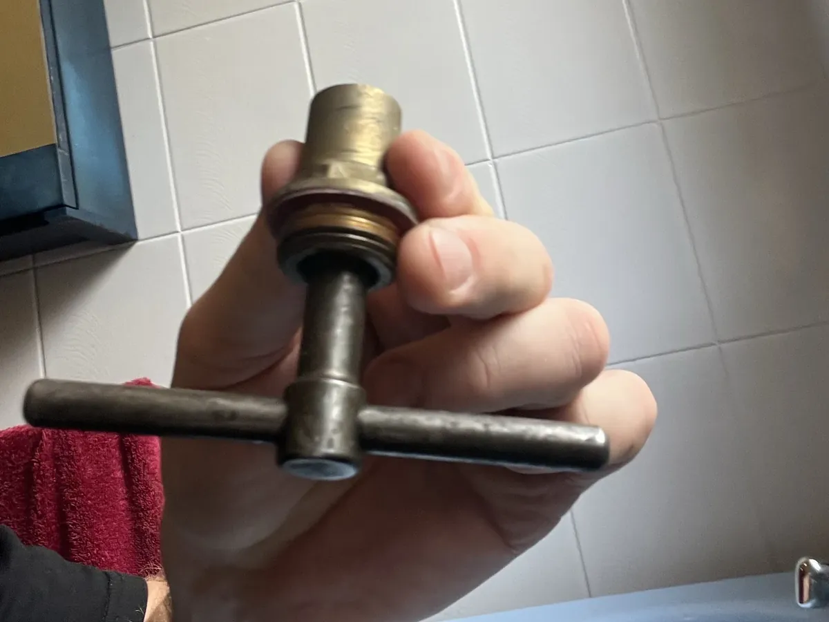 Worn tap spindle taken out to fix a dripping tap in Beverly Hills