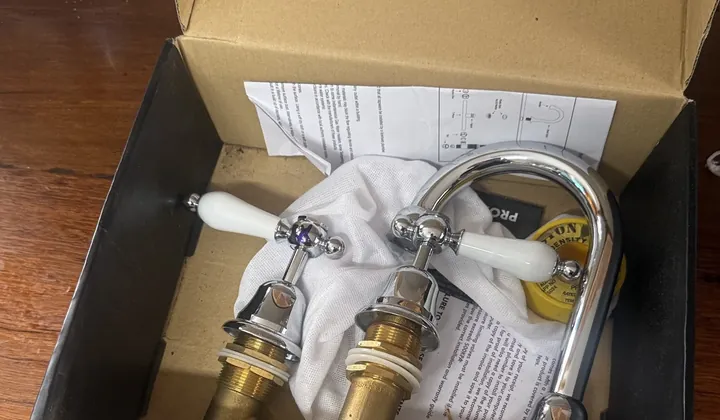 New chrome basin tap set with ceramic handles in its box, ready to fit, in Greystanes
