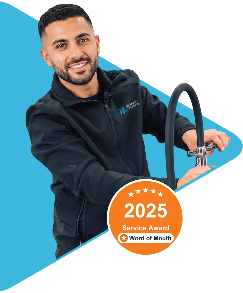 Plumber in a Mr Splash Plumbing jacket fitting a kitchen mixer tap, beside the 2025 Word of Mouth Service Award badge