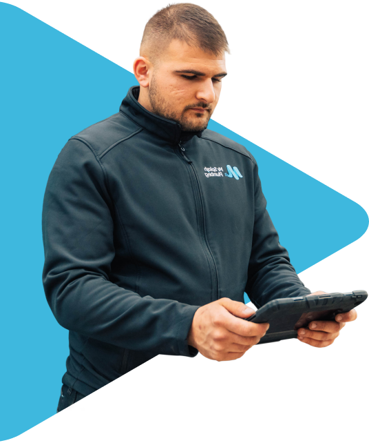 Mr Splash Plumbing Team Member with tablet device