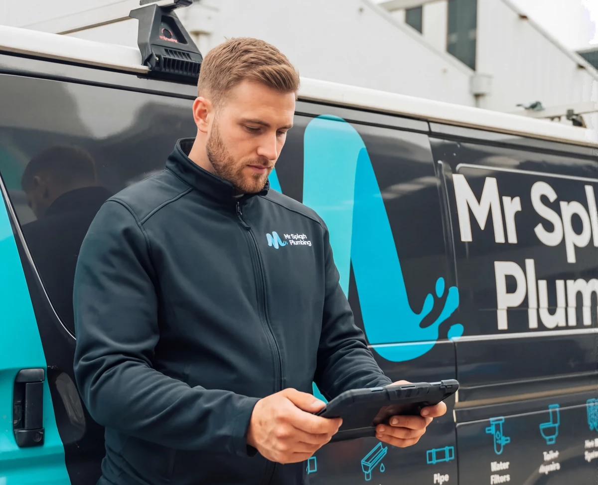 Mr Splash Plumbing roof plumber with branded van